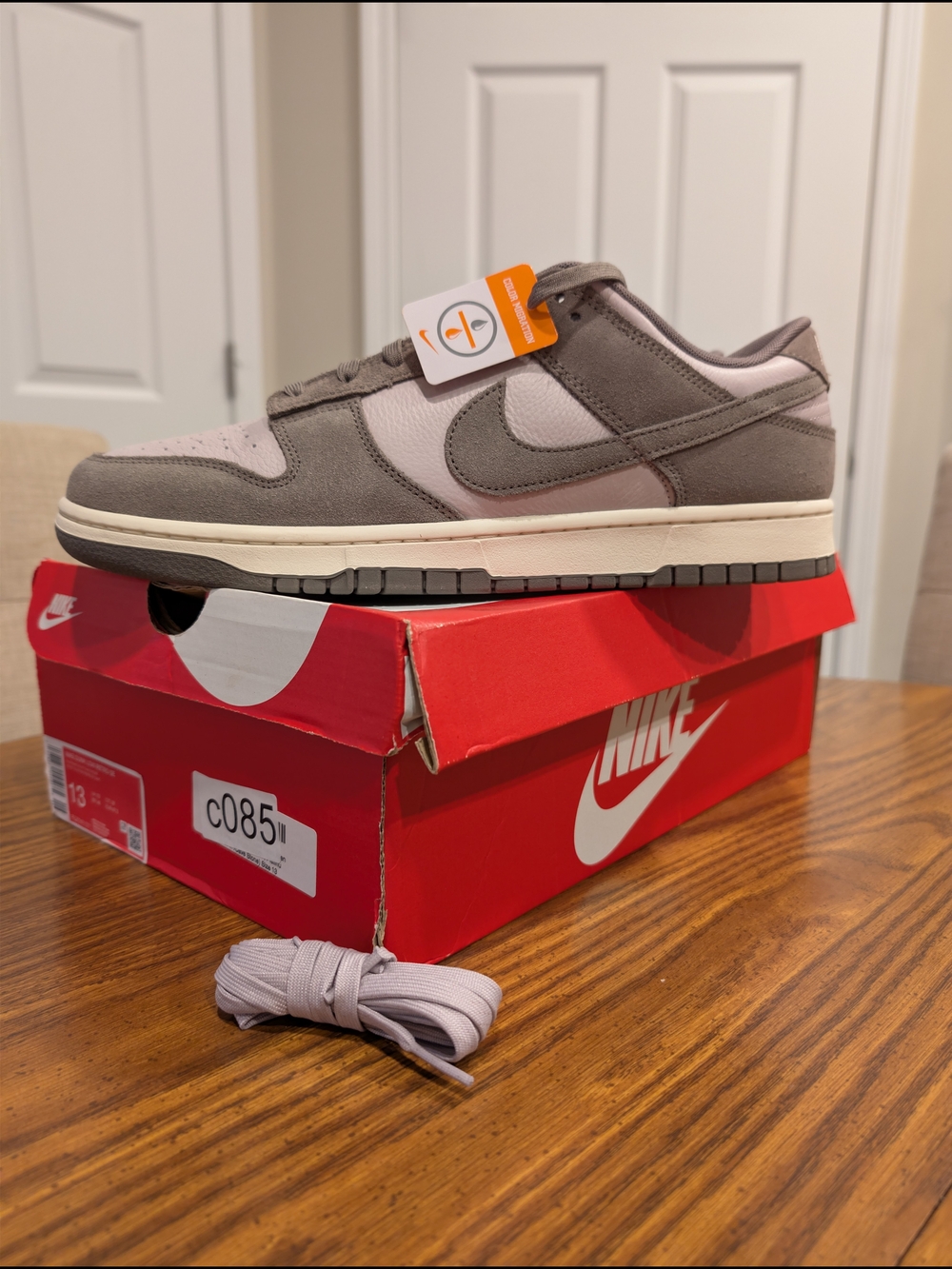 Nike Dunk Low Retro Sneakers in Gray and Light Pink